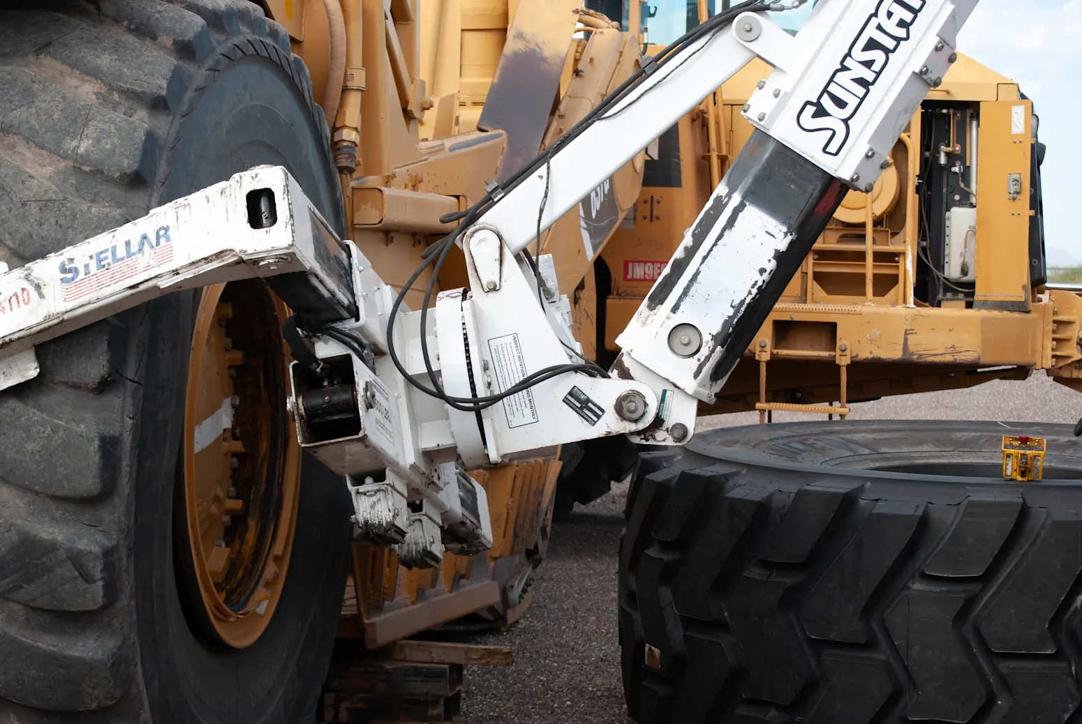 Technician removing tire